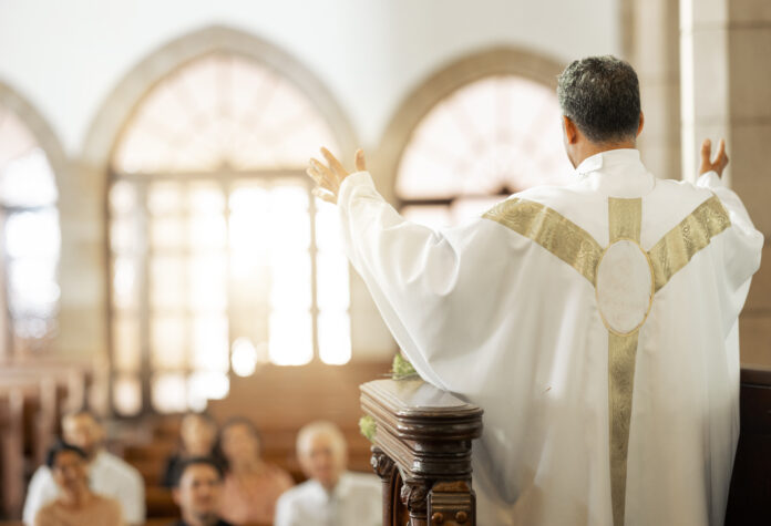 pastor-church-and-man-praying-for-his-congregatio-2026-01-09-11-11-19-utc